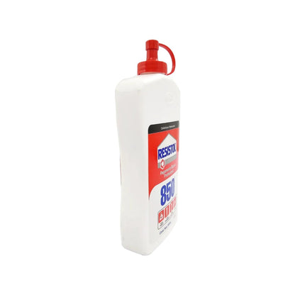 Pegamento blanco profesional Resistol 850 de 500g en botella blanca con tapa roja para uso en ferretería y hogar