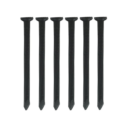 Seis clavos negros para concreto 2 1/2" calibre 8, cabeza plana y punta afilada, fijación robusta