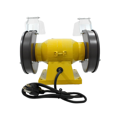 Esmeril de banco amarillo con micas de seguridad y protectores de disco para afilado y desbaste en taller.
