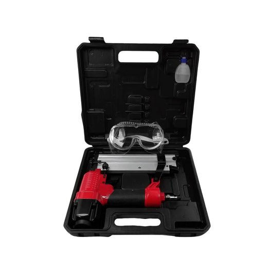 Kit de clavadora y engrapadora neumática roja/negra con gafas de seguridad y lubricante en estuche rígido.