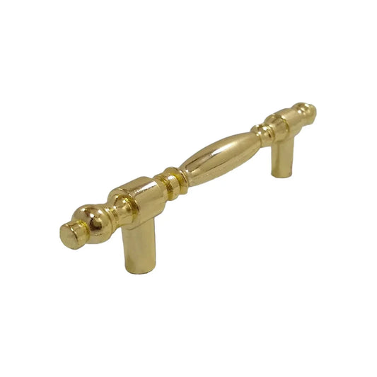 Acabado latón brillante.,Jaladera para mueble.,Largo total: 119 mm,Centro a centro: 76 mm