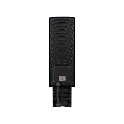 Lámpara suburbana LED 100W negra, parte trasera con disipador de calor tipo aletas y cable de alimentación.