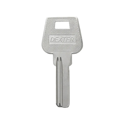 Llave virgen marca Dexter color plata para duplicados de cerrajería en puertas y cilindros residenciales.
