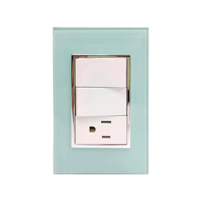 Placa eléctrica moderna de cristal azul claro con dos interruptores y un contacto, acabado elegante.